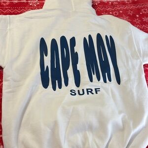 Selling Gildan Cape May hoodie it’s a medium and color is white